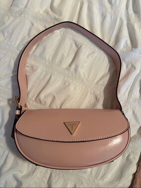 GUESS Blush Pink Crescent Shoulder Bag with Gold Triangle Logo